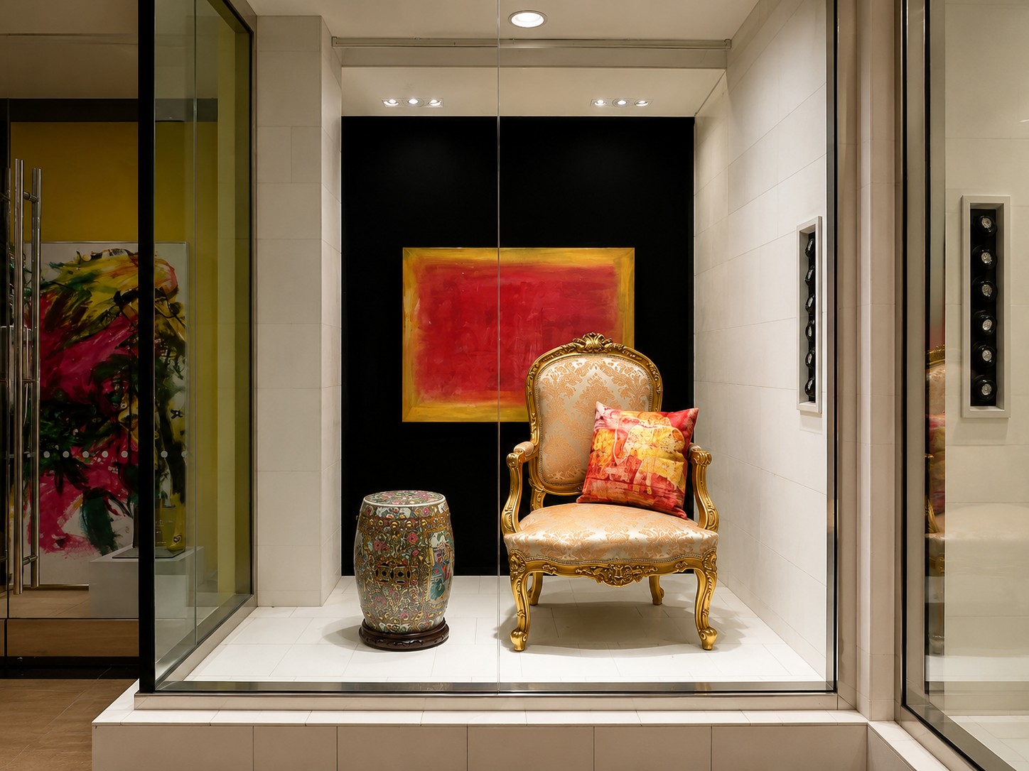 Kai Koto gallery window with gilded chair, Asian garden stool and artwork